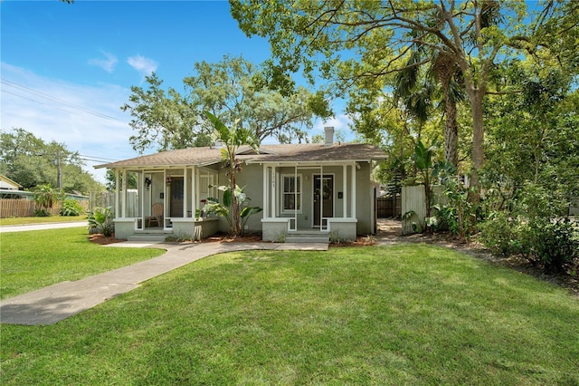 1201 S Myrtle Ave, Sanford, FL 32771 - view of front of house featuring stucco siding, a porch, and a shingled roof