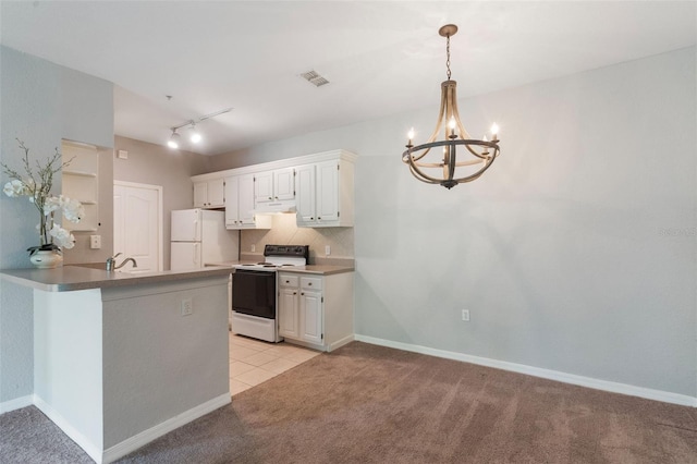 1400 Lake Shadow Cir Unit 10104, Maitland, FL 32751 - kitchen featuring freestanding refrigerator, range with electric cooktop, light colored carpet, a chandelier, and a peninsula
