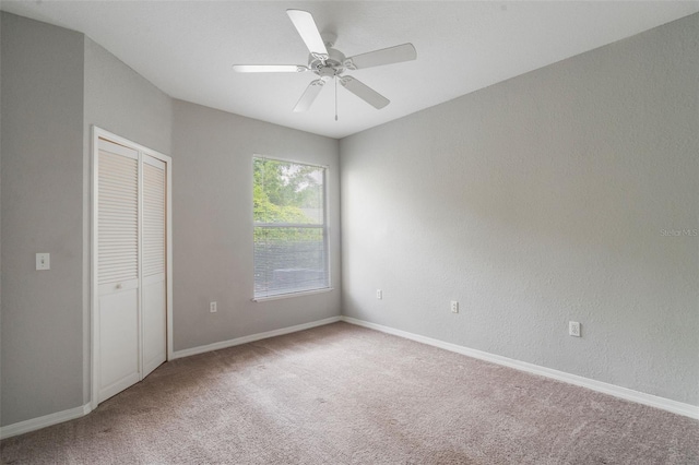 1400 Lake Shadow Cir Unit 10104, Maitland, FL 32751 - unfurnished bedroom featuring carpet floors, a closet, and ceiling fan