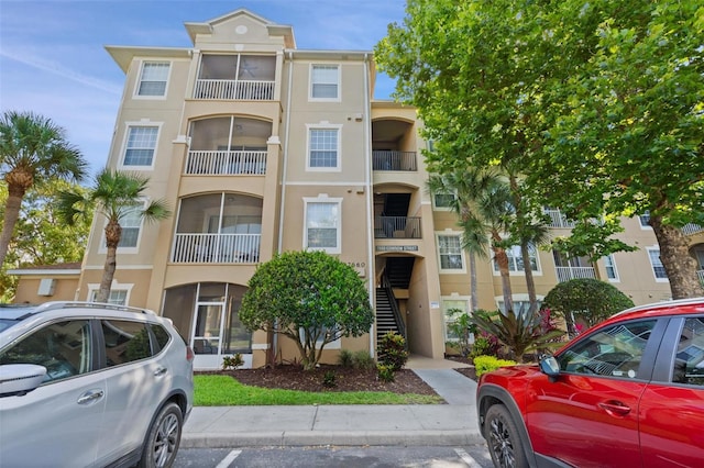 7660 Comrow St Unit 203, Kissimmee, FL 34747 - view of apartment building / complex featuring stairs
