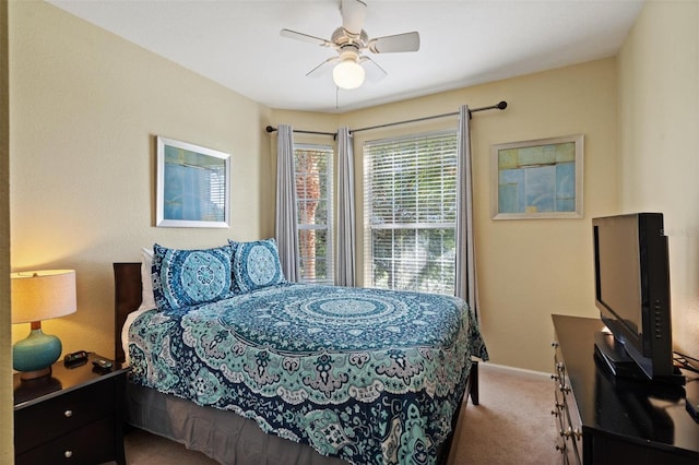 7660 Comrow St Unit 203, Kissimmee, FL 34747 - carpeted bedroom with baseboards and a ceiling fan