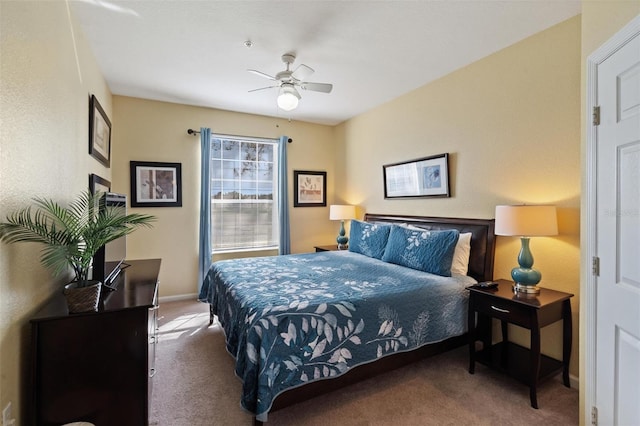7660 Comrow St Unit 203, Kissimmee, FL 34747 - carpeted bedroom featuring baseboards and a ceiling fan