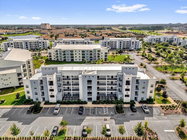 3180 Paradox Cir Unit 304, Kissimmee, FL 34746 - drone / aerial view of apartment complex and a large body of water