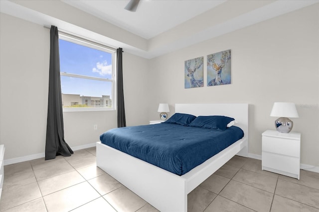 3180 Paradox Cir Unit 304, Kissimmee, FL 34746 - tiled bedroom with baseboards and a ceiling fan