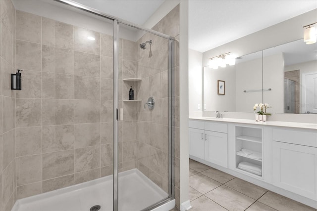 3180 Paradox Cir Unit 304, Kissimmee, FL 34746 - bathroom with tile patterned flooring, double vanity, and a stall shower