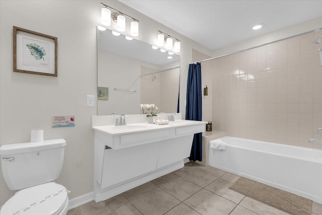 3180 Paradox Cir Unit 304, Kissimmee, FL 34746 - bathroom featuring toilet, shower / bath combo, tile patterned floors, and double vanity