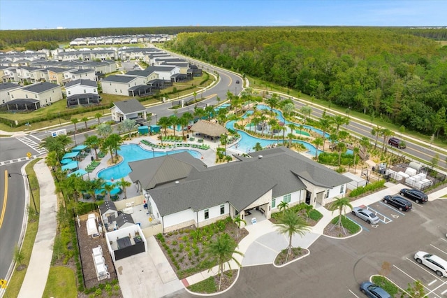 3180 Paradox Cir Unit 304, Kissimmee, FL 34746 - drone / aerial view of a pool and a forest