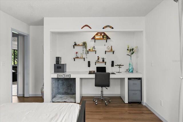 930 Chickadee Dr, Port Orange, FL 32127 - bedroom with dark wood-type flooring and baseboards