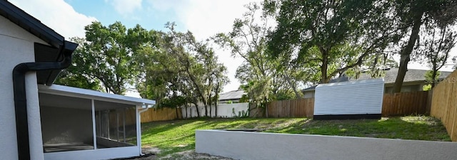 5118 Log Wagon Rd, Ocoee, FL 34761 - view of yard with a sunroom