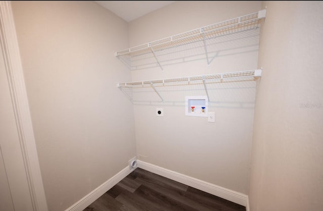 5118 Log Wagon Rd, Ocoee, FL 34761 - laundry area with electric dryer hookup, baseboards, dark wood-style flooring, and hookup for a washing machine