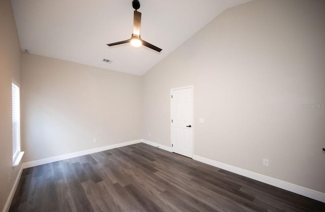 5118 Log Wagon Rd, Ocoee, FL 34761 - empty room featuring ceiling fan, dark wood finished floors, baseboards, and high vaulted ceiling
