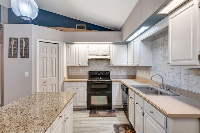 10711 Lake Hill Dr, Clermont, FL 34711 - kitchen with black appliances, vaulted ceiling, light countertops, under cabinet range hood, and tasteful backsplash
