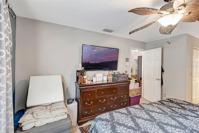 10711 Lake Hill Dr, Clermont, FL 34711 - bedroom with carpet flooring, ceiling fan, and a textured ceiling