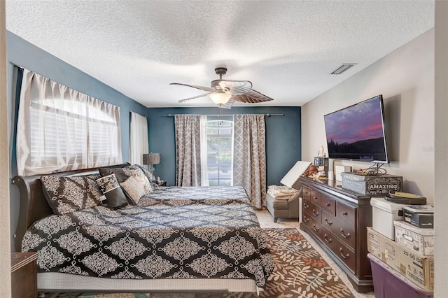 10711 Lake Hill Dr, Clermont, FL 34711 - carpeted bedroom with a textured ceiling and ceiling fan