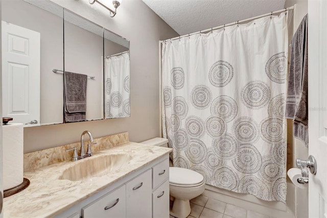 10711 Lake Hill Dr, Clermont, FL 34711 - full bathroom with vanity, a textured ceiling, and tile patterned flooring