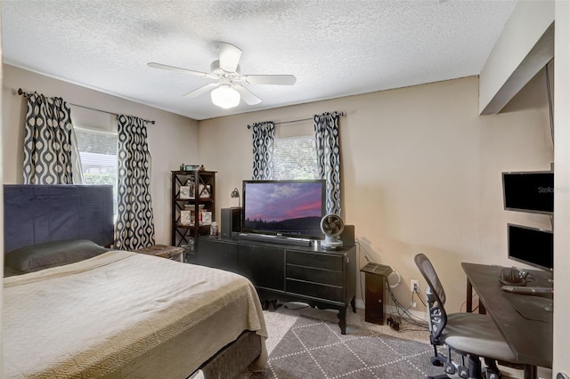 10711 Lake Hill Dr, Clermont, FL 34711 - carpeted bedroom with multiple windows, a textured ceiling, and ceiling fan