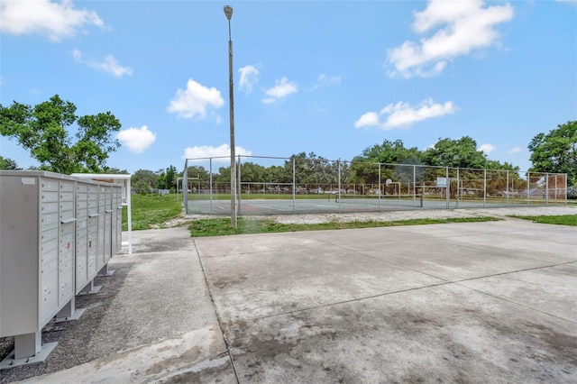 10711 Lake Hill Dr, Clermont, FL 34711 - view of community featuring a tennis court and mail area