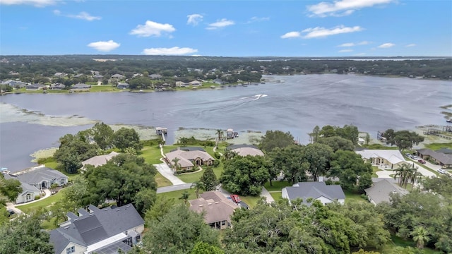 10711 Lake Hill Dr, Clermont, FL 34711 - aerial overview of property's location with nearby suburban area and a large body of water