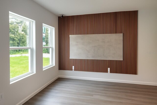 313 Bass Ct, Kissimmee, FL 34759 - unfurnished room featuring wood finished floors and baseboards
