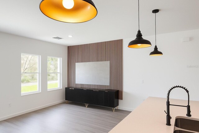 313 Bass Ct, Kissimmee, FL 34759 - dining space featuring wood finished floors and recessed lighting