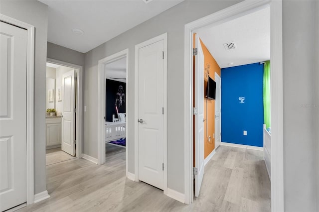 720 Gardenia Ln, Davenport, FL 33897 - hall featuring light wood-type flooring