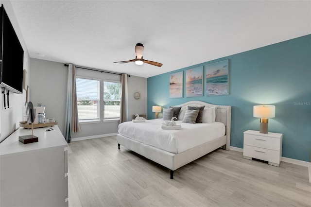 720 Gardenia Ln, Davenport, FL 33897 - bedroom featuring light wood finished floors and a ceiling fan