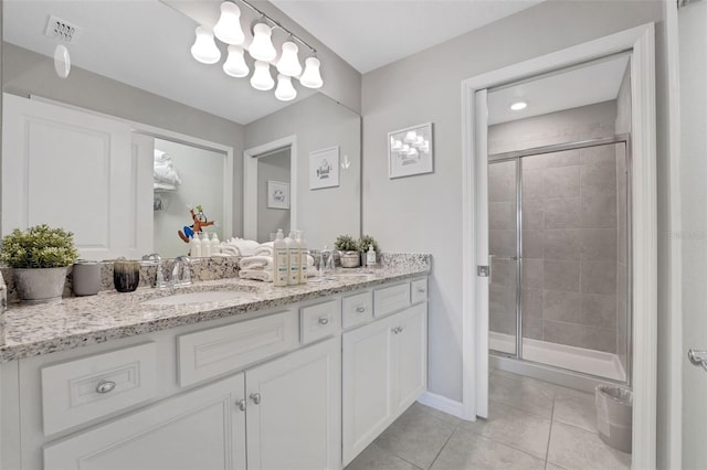 720 Gardenia Ln, Davenport, FL 33897 - full bath with vanity, tile patterned floors, and a shower stall