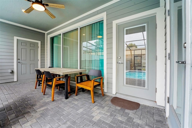 720 Gardenia Ln, Davenport, FL 33897 - view of patio / terrace with a ceiling fan and outdoor dining space