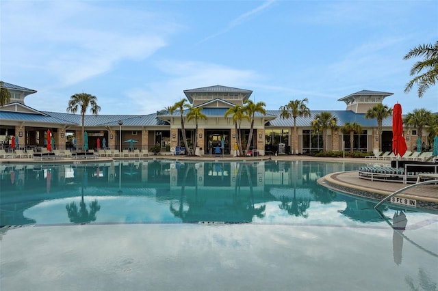 720 Gardenia Ln, Davenport, FL 33897 - community pool featuring a patio
