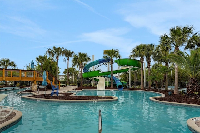 720 Gardenia Ln, Davenport, FL 33897 - community pool with a water slide