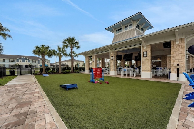 720 Gardenia Ln, Davenport, FL 33897 - view of community with a patio area