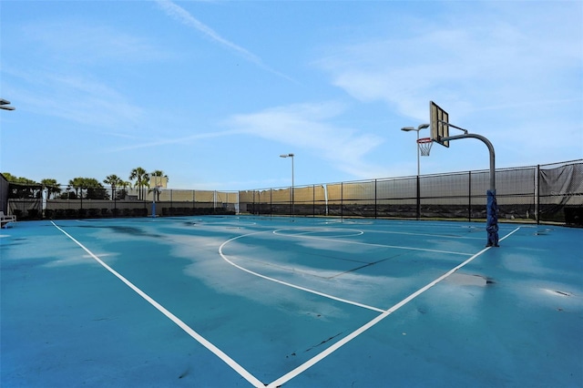 720 Gardenia Ln, Davenport, FL 33897 - view of sport court with community basketball court