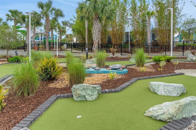 720 Gardenia Ln, Davenport, FL 33897 - view of home's community featuring a putting green