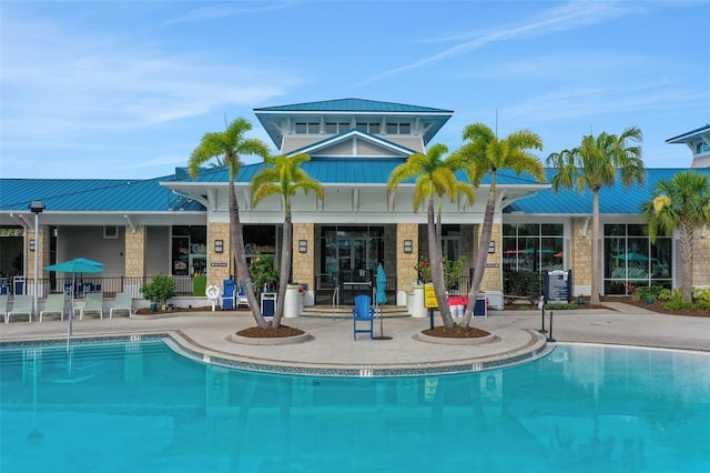 720 Gardenia Ln, Davenport, FL 33897 - community pool featuring a patio