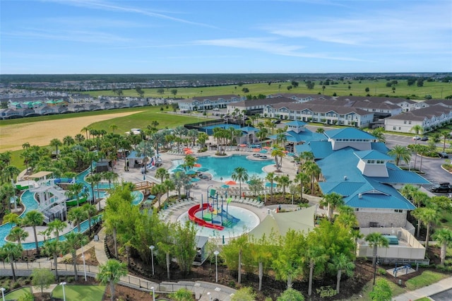720 Gardenia Ln, Davenport, FL 33897 - aerial perspective of suburban area featuring a pool area