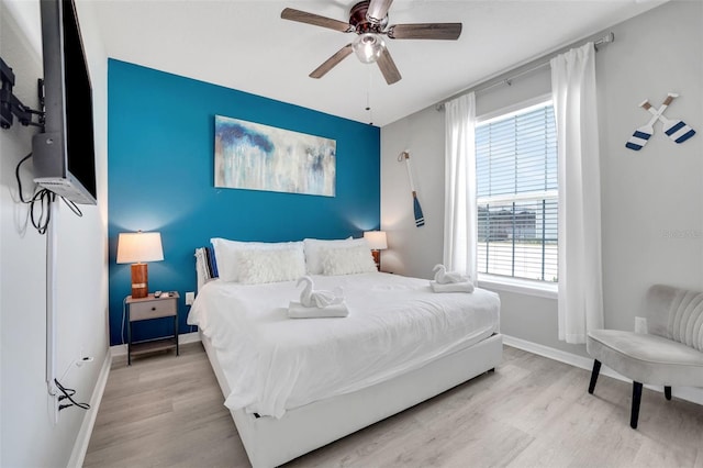 720 Gardenia Ln, Davenport, FL 33897 - bedroom with wood finished floors and ceiling fan