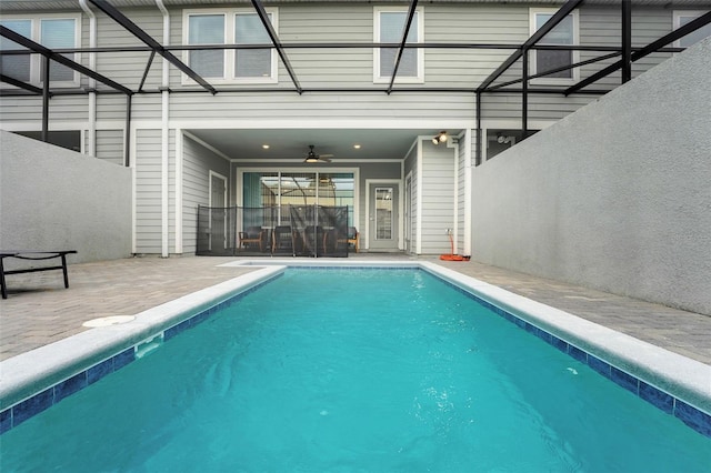 720 Gardenia Ln, Davenport, FL 33897 - outdoor pool with a patio area and ceiling fan