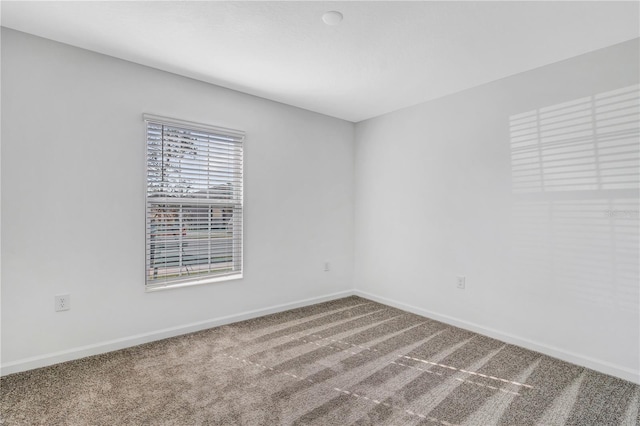 865 Citrus Reserve Blvd, Davenport, FL 33837 - carpeted empty room with baseboards