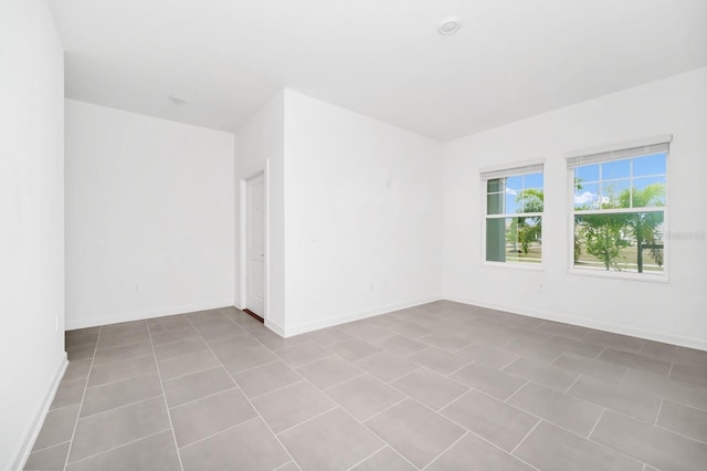 1596 Contentment Loop, Kissimmee, FL 34744 - empty room featuring baseboards