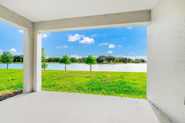 1596 Contentment Loop, Kissimmee, FL 34744 - view of patio / terrace featuring a water view