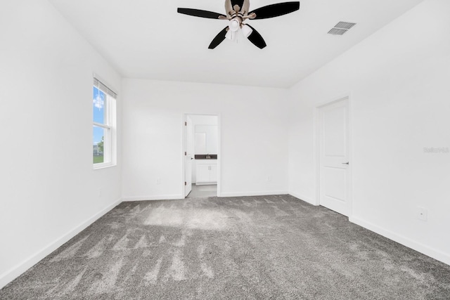 1596 Contentment Loop, Kissimmee, FL 34744 - carpeted spare room featuring a ceiling fan and baseboards