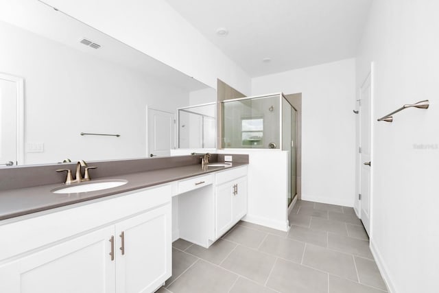 1596 Contentment Loop, Kissimmee, FL 34744 - full bathroom with double vanity, a stall shower, tile patterned flooring, and baseboards