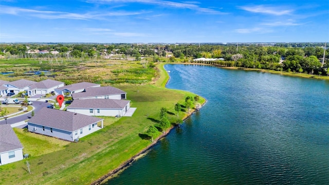 1596 Contentment Loop, Kissimmee, FL 34744 - aerial perspective of suburban area with a large body of water and a tree filled landscape