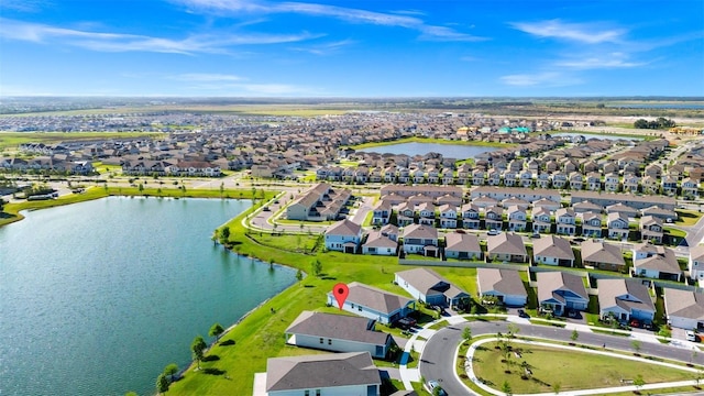 1596 Contentment Loop, Kissimmee, FL 34744 - aerial view of residential area with a nearby body of water