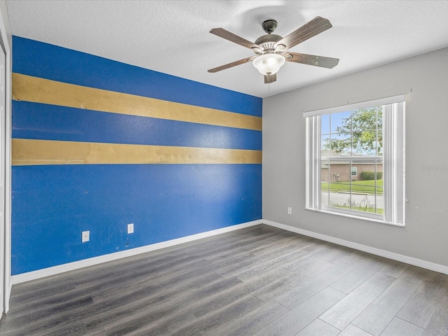 112 Lake Butler Ave, Haines City, FL 33844 - empty room with wood finished floors, baseboards, and a ceiling fan