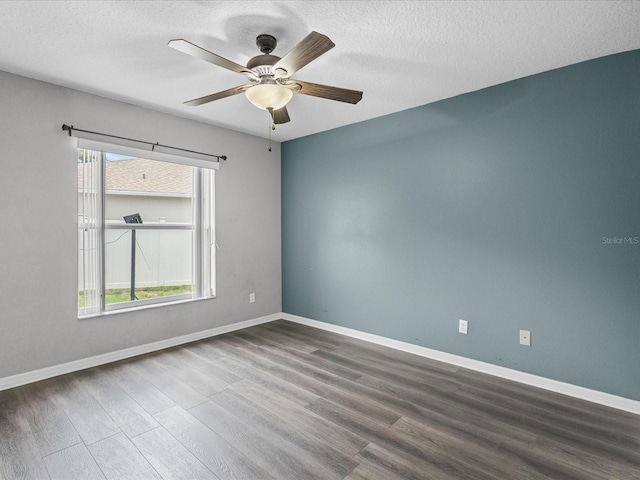 112 Lake Butler Ave, Haines City, FL 33844 - empty room featuring wood finished floors, a ceiling fan, a textured ceiling, and baseboards