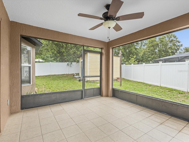 112 Lake Butler Ave, Haines City, FL 33844 - unfurnished sunroom featuring a ceiling fan