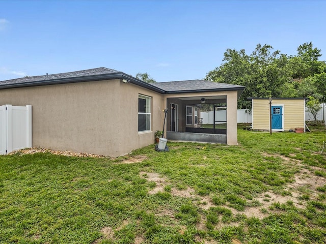 112 Lake Butler Ave, Haines City, FL 33844 - back of house featuring a sunroom and stucco siding