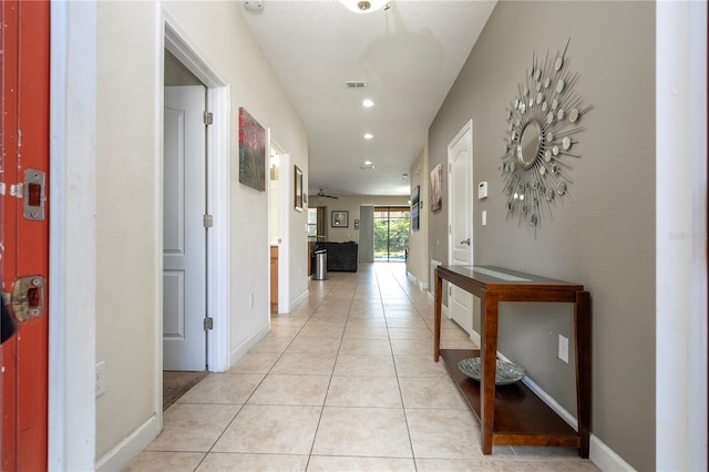 1439 Moon Valley Dr, Davenport, FL 33896 - hall featuring light tile patterned flooring and recessed lighting