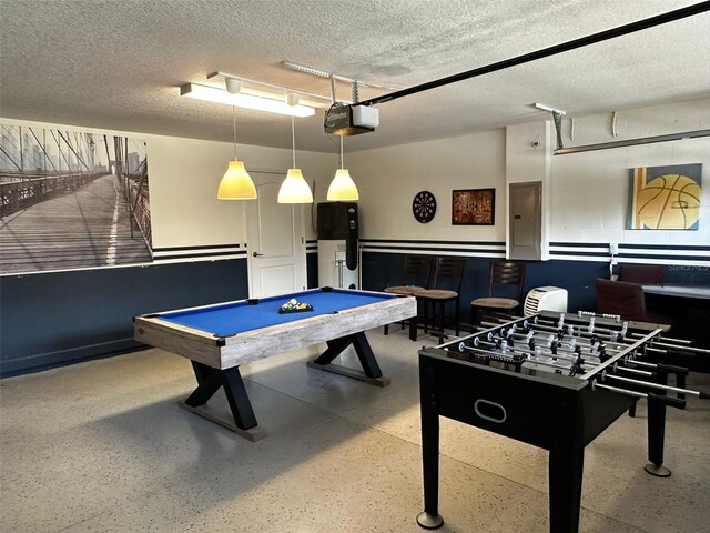 1439 Moon Valley Dr, Davenport, FL 33896 - playroom with speckled floor, electric panel, a textured ceiling, and pool table